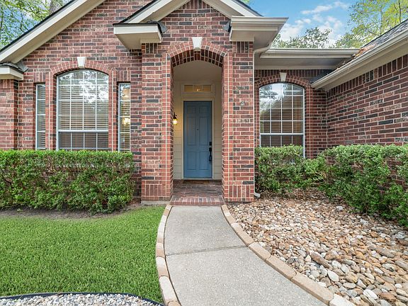 Nice covered entry and landscaping!