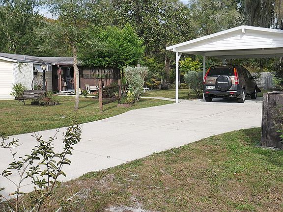 2-Car Carport & Driveway