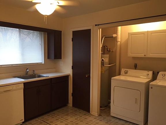 Laundry (w/washer dryer) room in kitchen