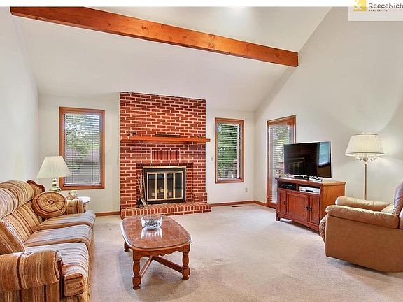 SPACIOUS 1.5 STORY WITH OPEN GREAT ROOM AND DOOR TO NEWLY PAINTED DECK.