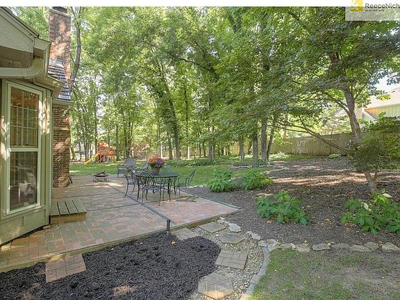 Enjoy the outdoors on your patio with your park-like backyard!