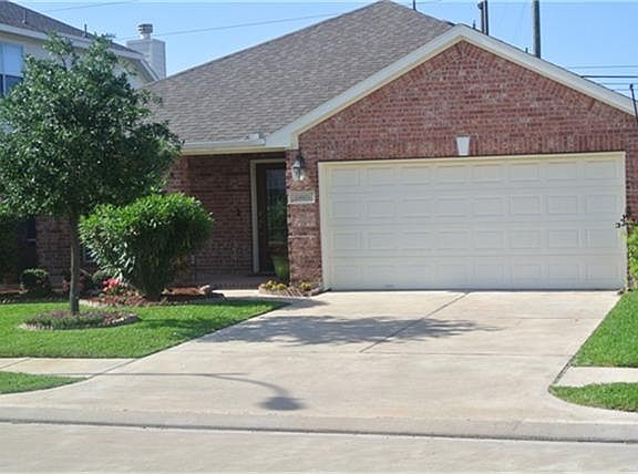 Front Elevation 2. Exterior features brick veneer and James Hardie cement board siding, trim and sof