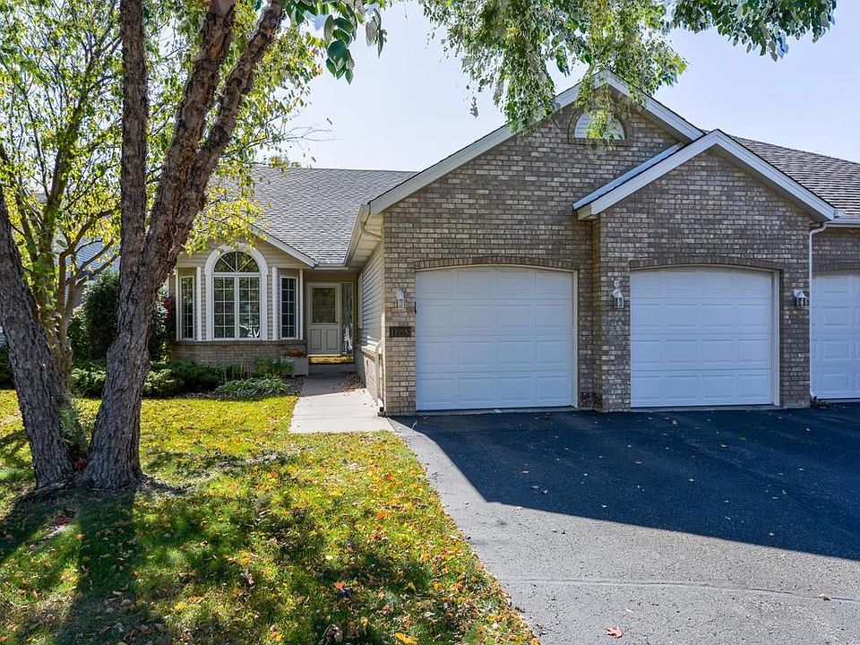 Flat driveway and front yard.