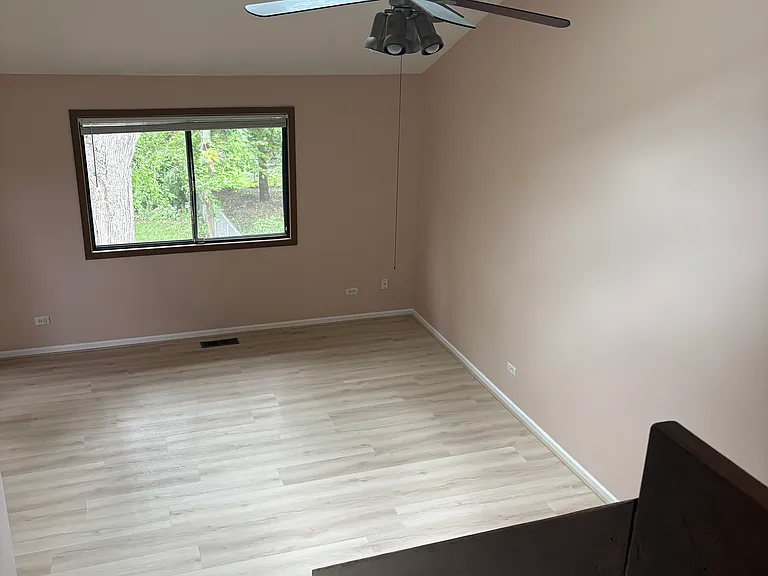 Spacious Living Room with Skylight