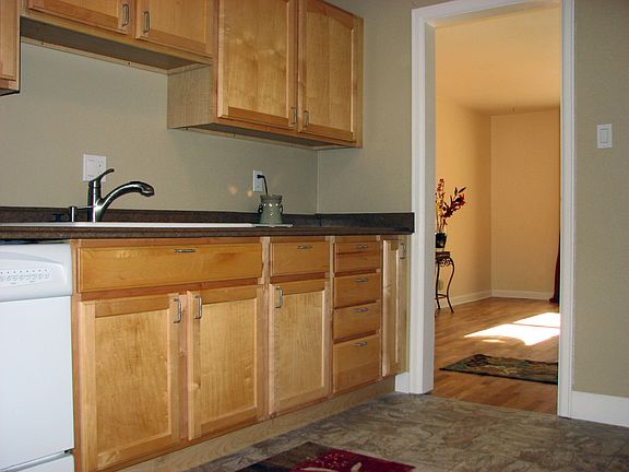 Kitchen with maple cabinets and new flooring