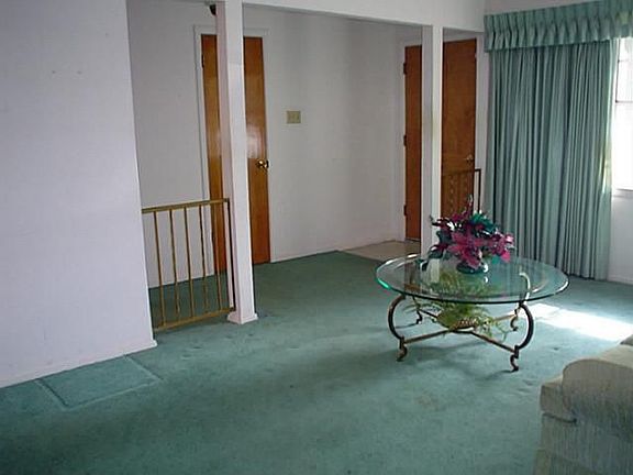 Another view of the formal dining/living area