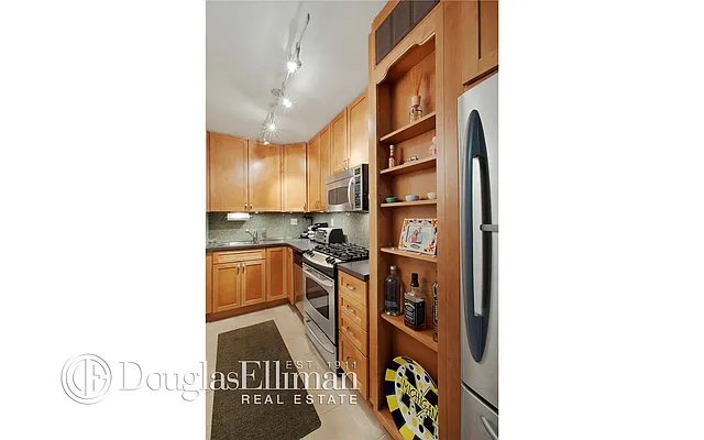 Sold by Douglas Elliman | media 10