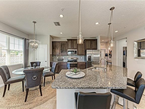 5th image of 8259 Enclave Way Unit 104