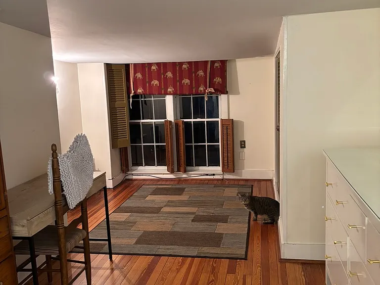 Large 3rd floor bedroom looking at the sitting area from the full bead