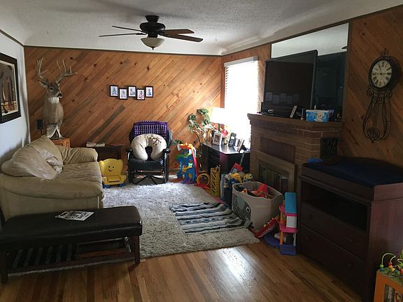 Spacious open living space with beautiful hardwood floors