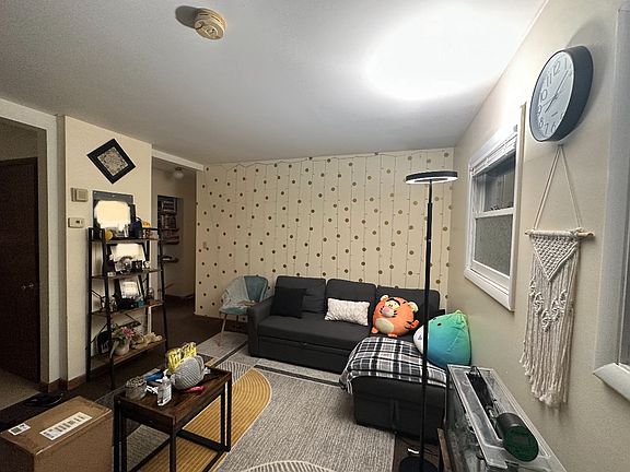 living room open to the kitchen area