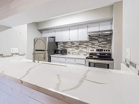 3rd image of 13608 S Village Dr #6203
