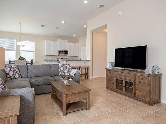 5th image of 7210 E Village Square