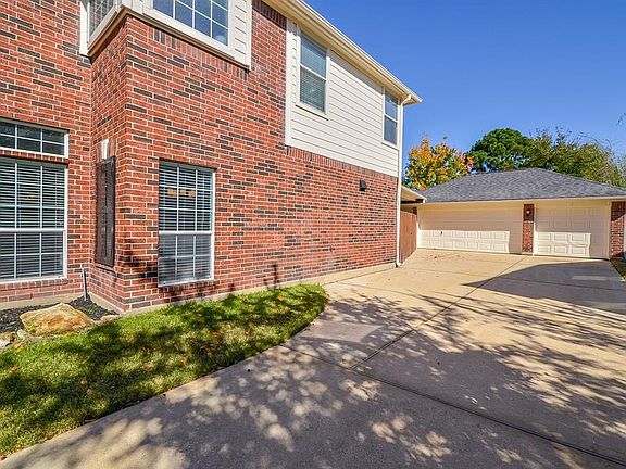 Extra wide driveway and a true three car garage.