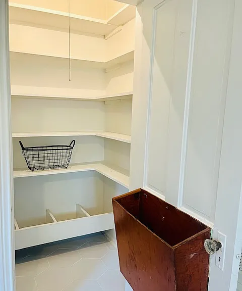 Large, freshly painted pantry