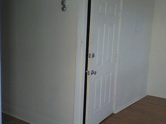 main room leading to bathroom