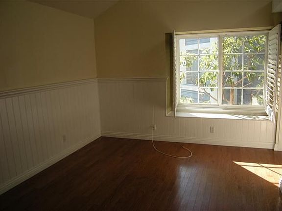 Wainscoting in bedroom gives custom touch