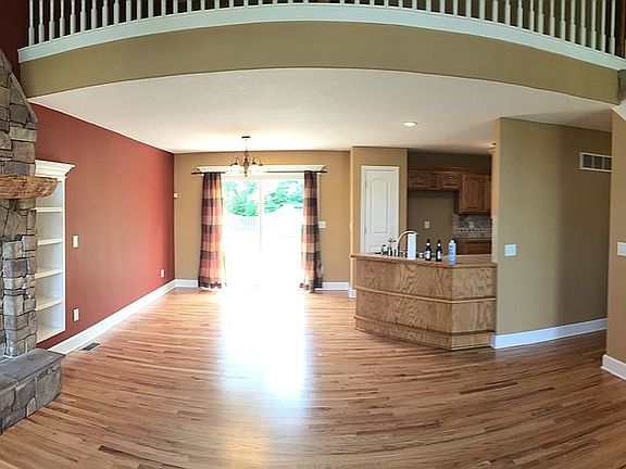 Open Concept- Wood Fireplace
