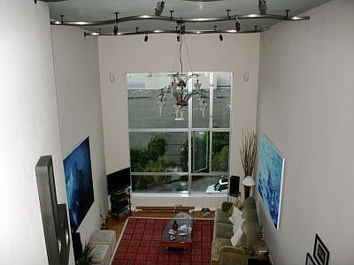 large living room with custom lighting