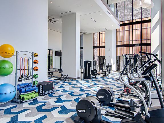 It looks good from up here. Two story gym with Peloton bikes.