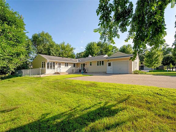 Backside of house. One car garage plus oversized driveway for extra off street parking. Separate entrance for main unit and mother-in-law suite.