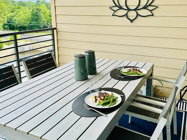 Dine al fresco on the large furnished balcony