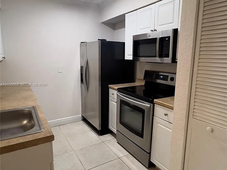 2880 N Oakland Forest Dr #107 — Photo 2