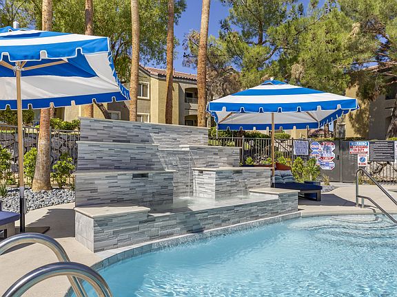 The centerpiece of the deck is an elegantly updated waterfall, adding a touch of tranquility with its soothing sounds.