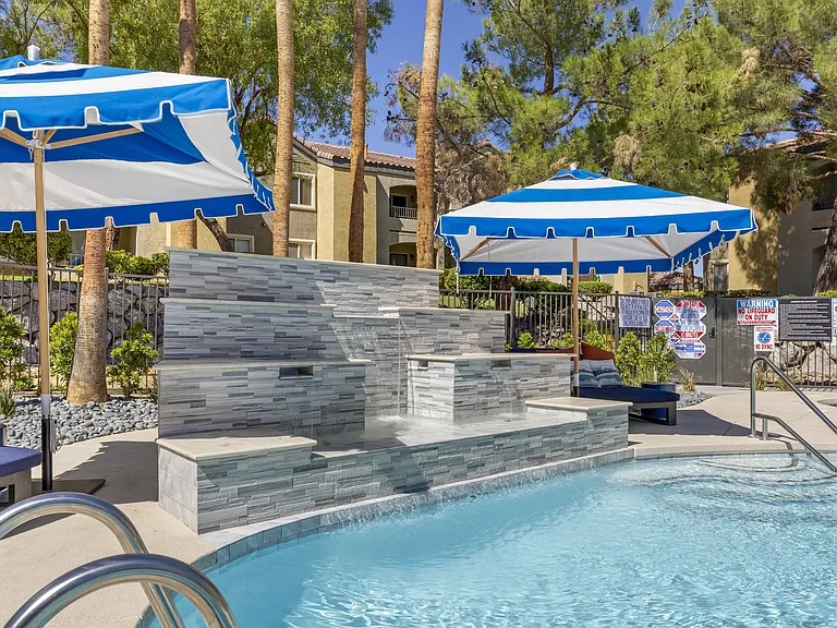The centerpiece of the deck is an elegantly updated waterfall, adding a touch of tranquility with its soothing sounds.