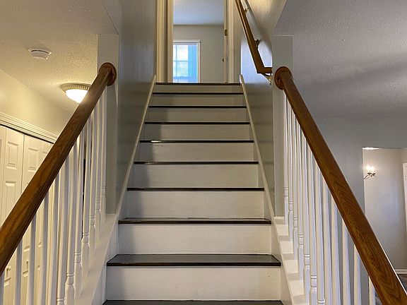 There are 3 bedrooms and 2 full baths upstairs