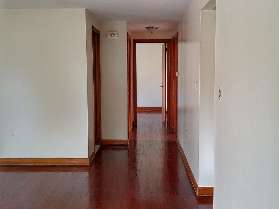 View from front door into living room and hallway