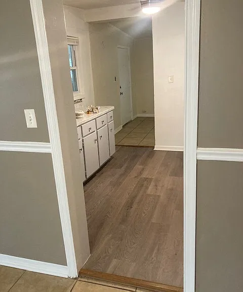 kitchen adjoins living room and family room