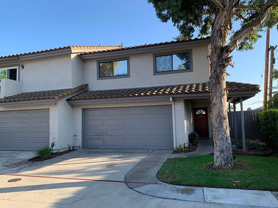 Two story townhome, corner home with side yard.
