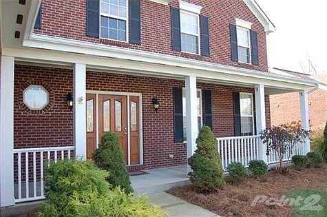 From this covered front porch you will appreciate the quiet cul-de-sac street and tasteful and beautifully maintained landscaping.  Notice the classy upgraded front door?