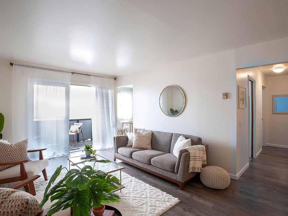 South end of living room, sliding doors to balcony