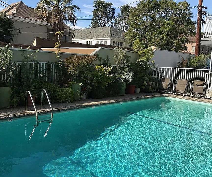 1st (top) floor apartment faces east-west. The west aspect overlooks the pool.