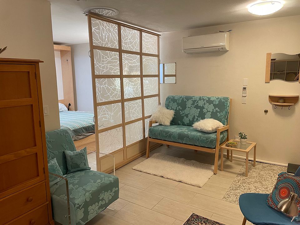 Living space and fold-down amoire