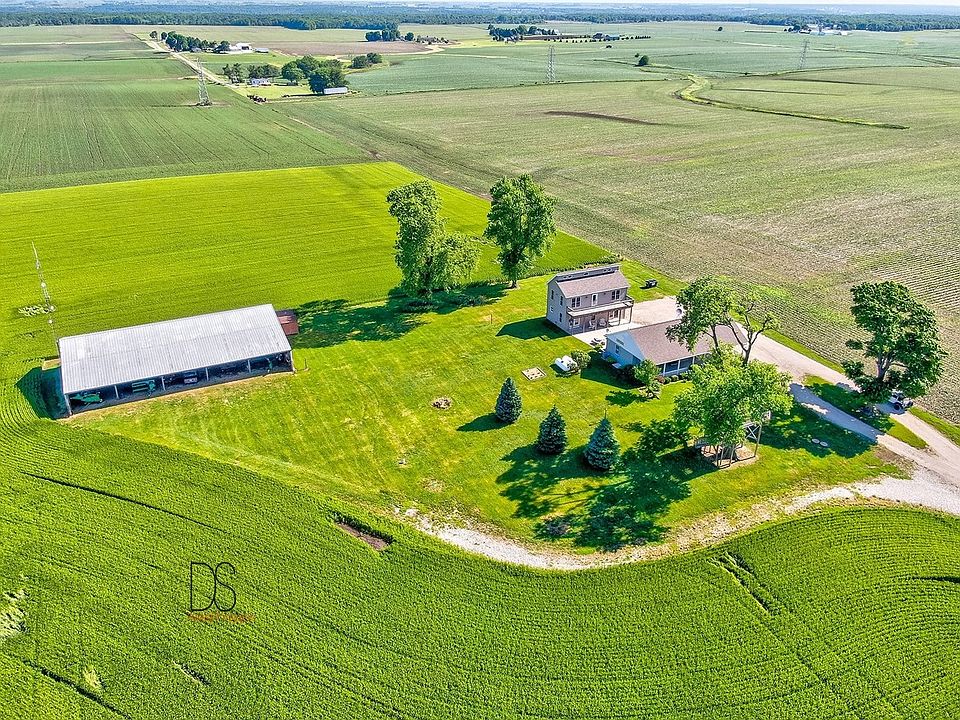 2 Homes and an out-building with land