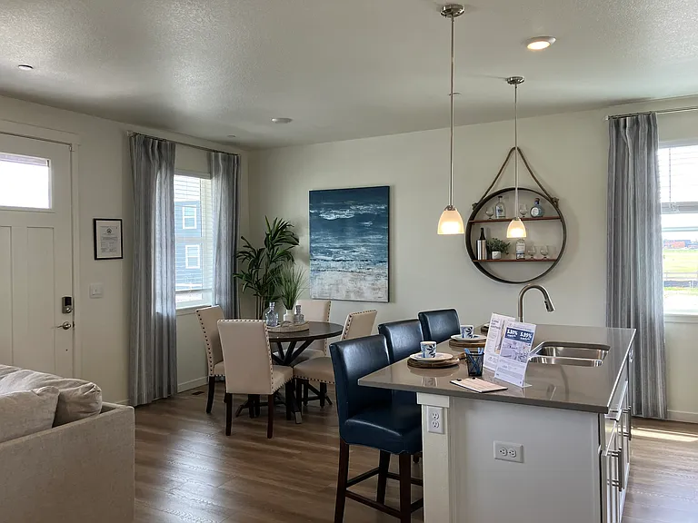 Sample of same floor plan, different finishes, staged with furniture.