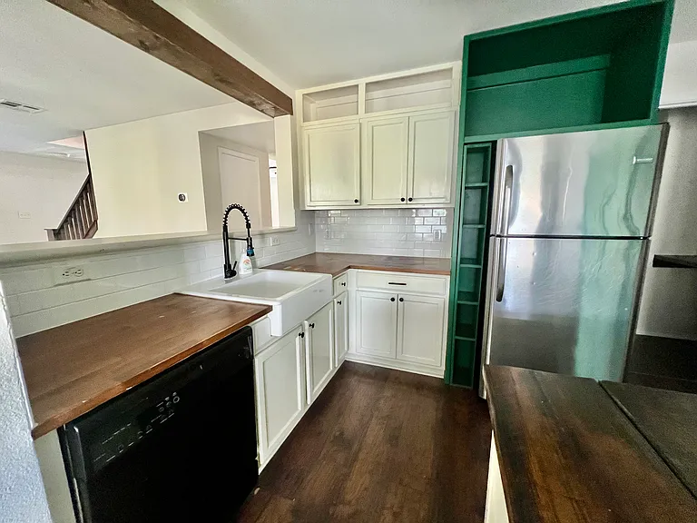 Dishwasher, refrigerator, stove and microwave included