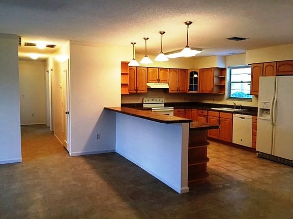 Kitchen/Hallway to rooms