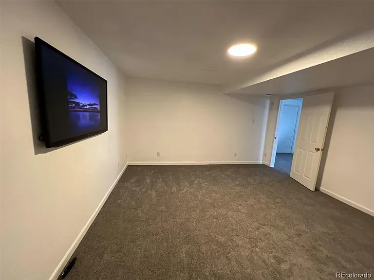 Entertainment room (TV stays with tenant) - or can be bedroom #7