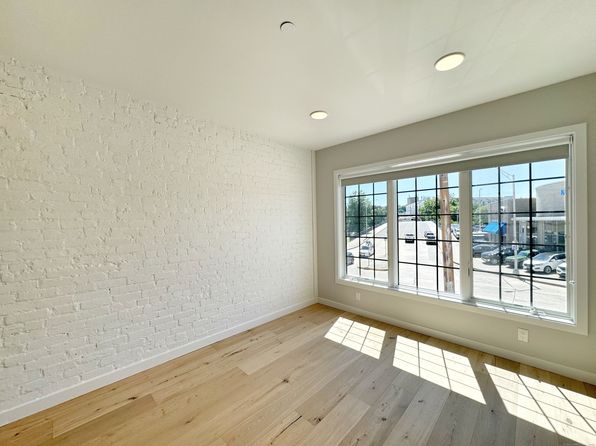 32 W Main St #205