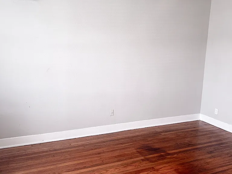 Large living area with ample outdoor lighting. New mini split units located in living ares and bedroom. New ceiling fans and lighting fixture throughout.