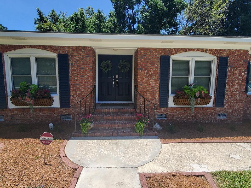 Single story, brick range, well cared for, and renovated home in the heart of James Island.