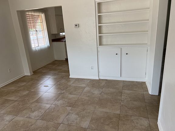 LIVING ROOM - VIEW FROM FRONT DOOR - PLENTY OF STORAGE