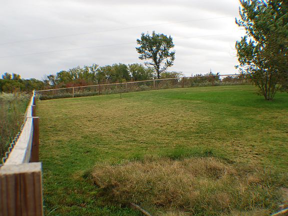Large fenced front yard