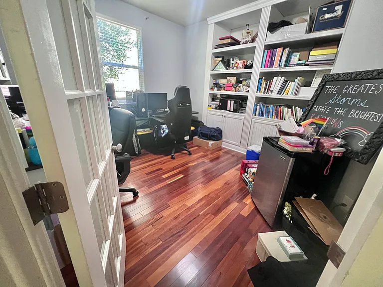 Office with French Door and Built-in Bookcase downstairs-Current