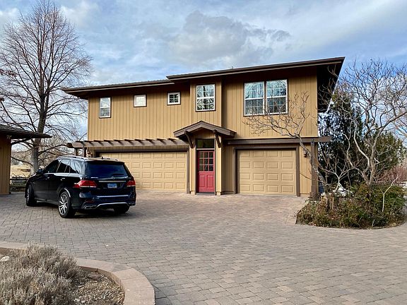 Parking on the right side of the garage. Apartment is above and is a stand-alone building