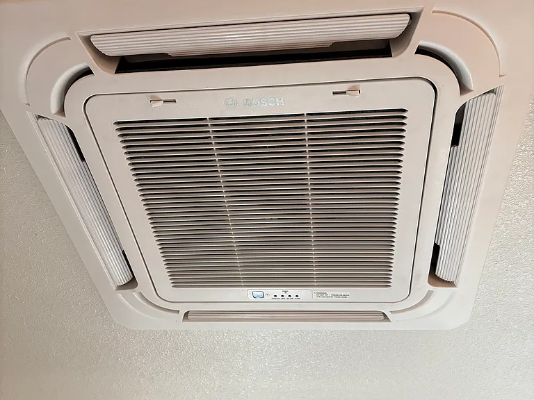 In ceiling central heating and air conditioning